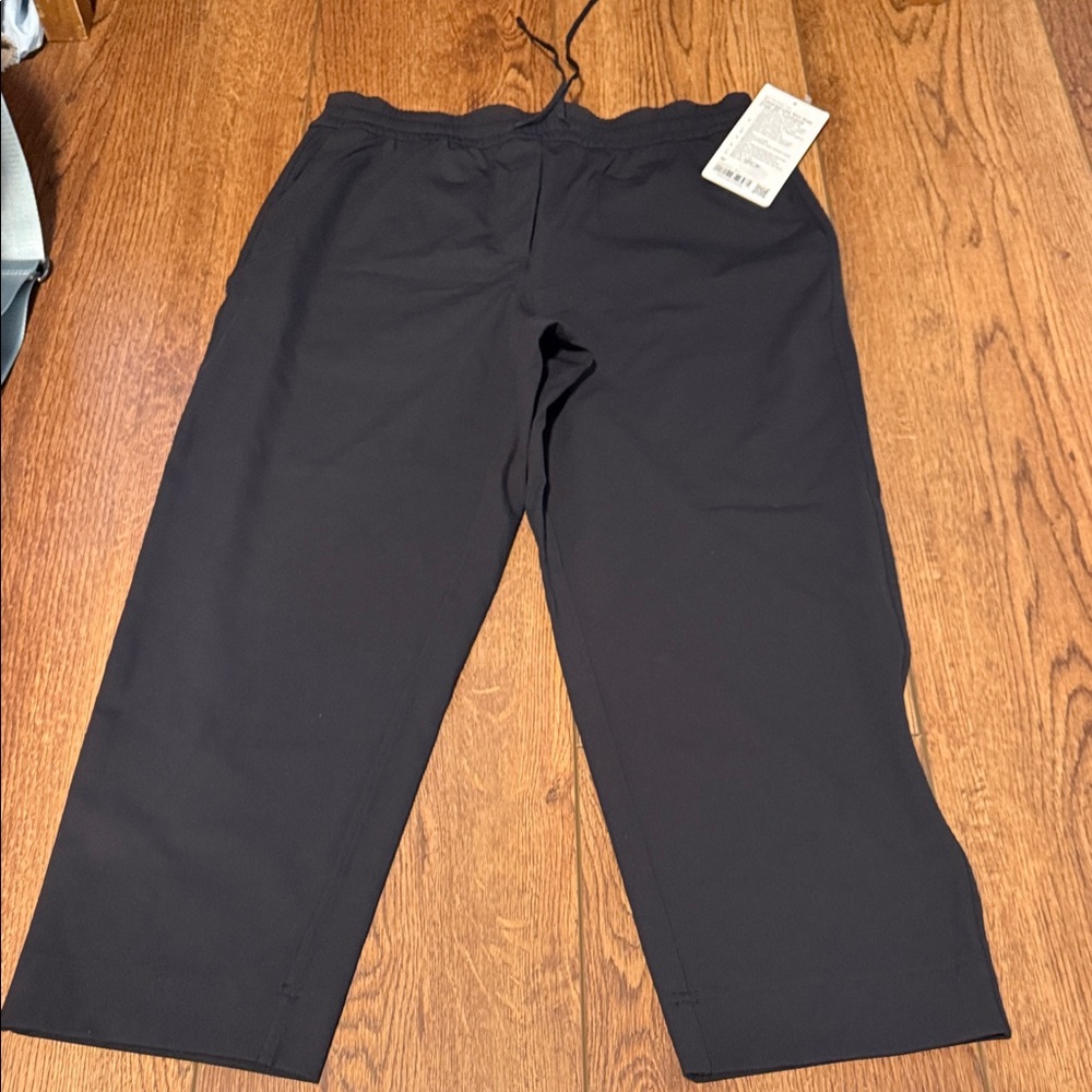 NWT Lululemon Black Tapered-Leg Mid-Rise Pants size M luxtreme